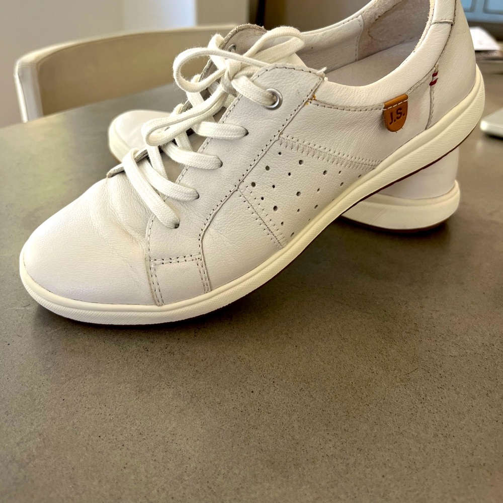 White leather Joseph Seibel athletic shoes.